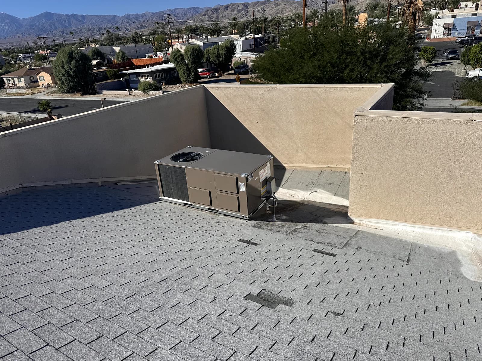 A new air conditioning unit installed on a rooftop